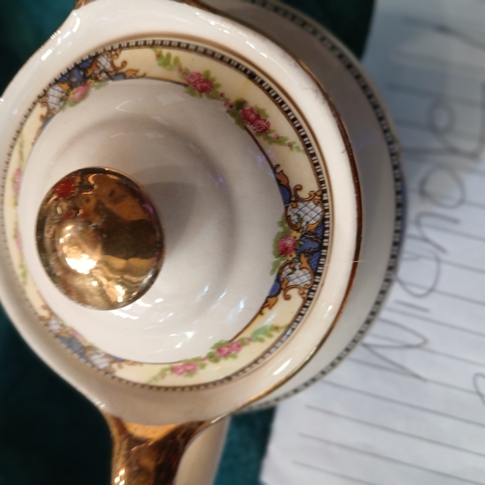 Elegant Floral Teapot with Gold Accents